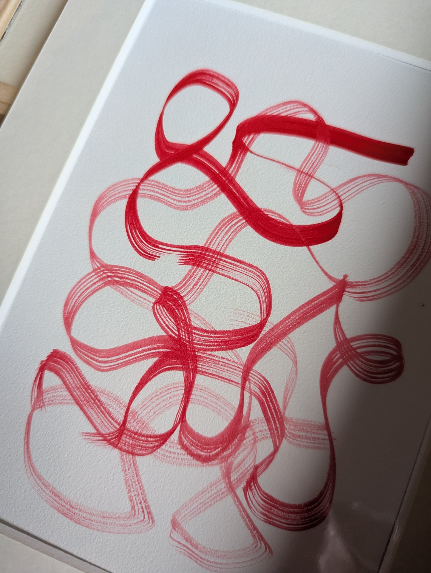 Red abstract art on paper 