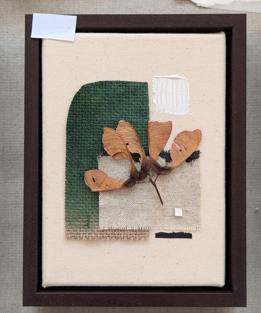 Handmade framed artwork from the Elements series with natural materials and textured design.